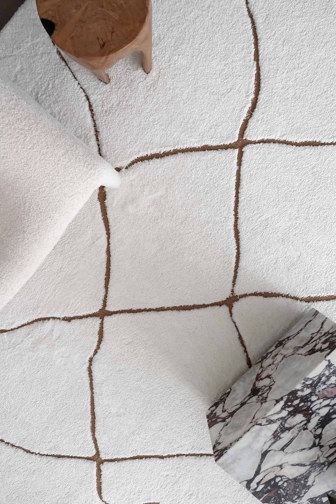 Alayna Cream and Gold Tribal Shag Rug