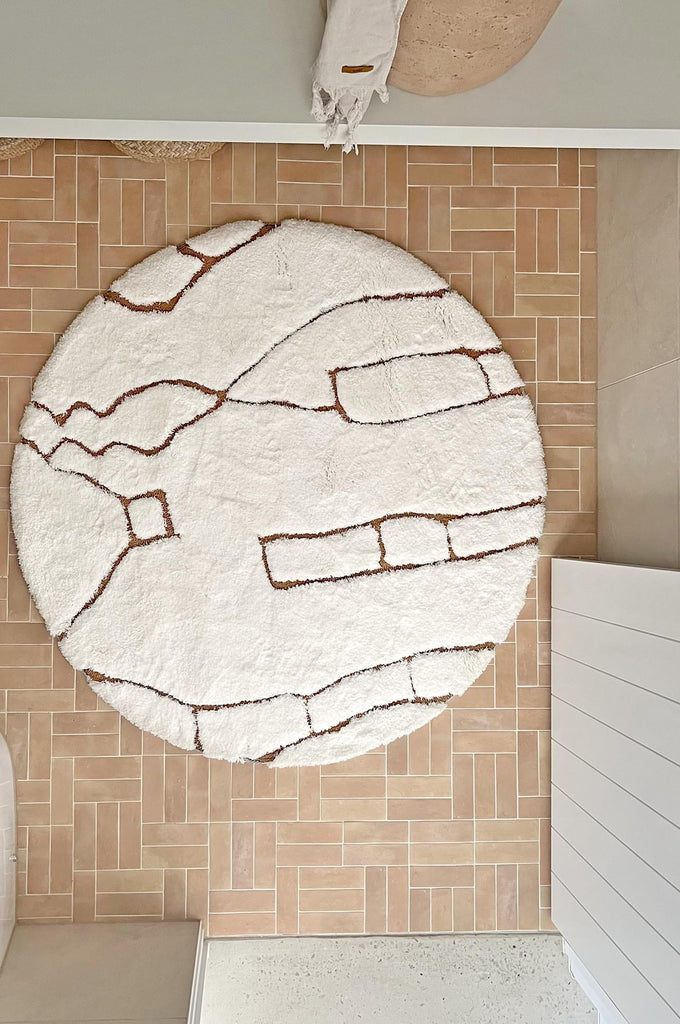 Alayna Cream and Gold Tribal Round Shag Rug