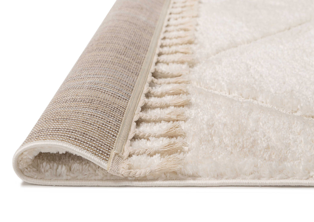 Calypso Ivory Cream Textured Tribal Tassel Rug