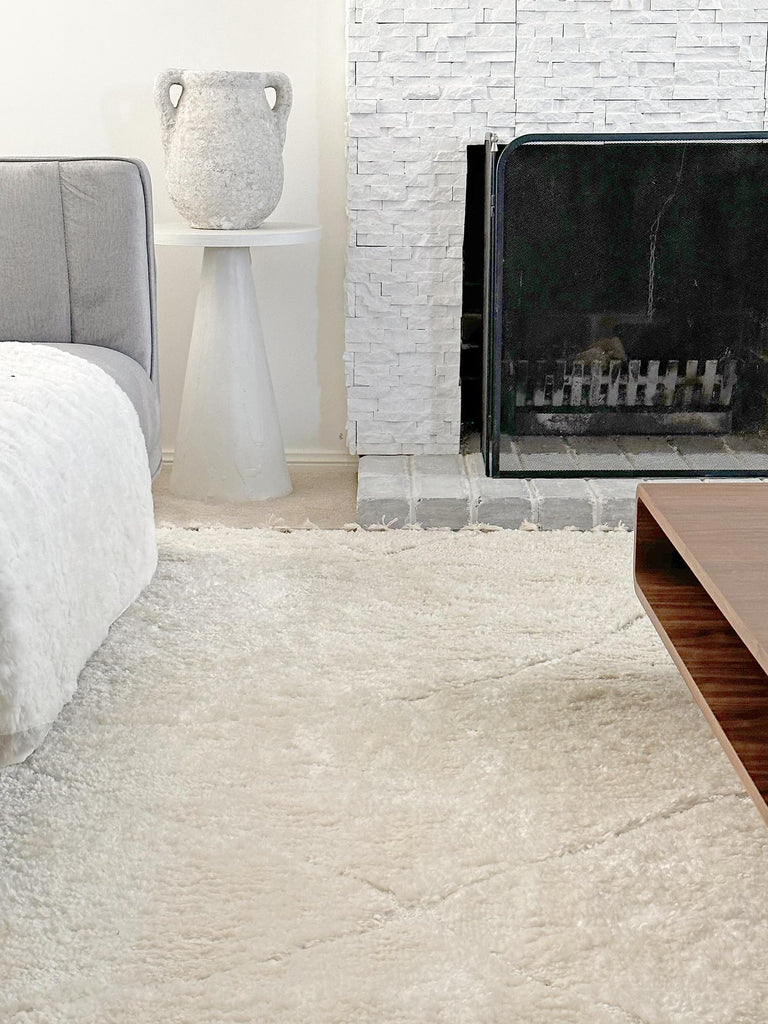 Calypso Ivory Cream Textured Tribal Tassel Rug