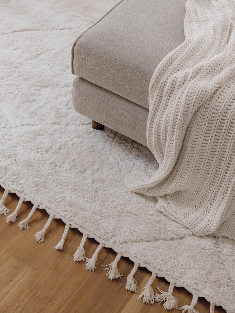 Calypso Ivory Cream Textured Tribal Tassel Rug