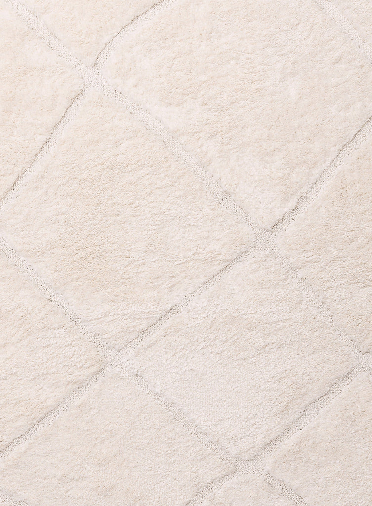 Calypso Ivory Cream Textured Tribal Tassel Rug