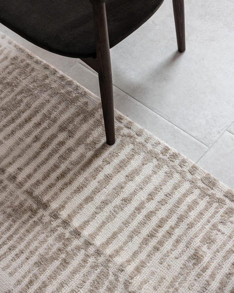 Nahba Ivory And Cream Textured Tribal Rug
