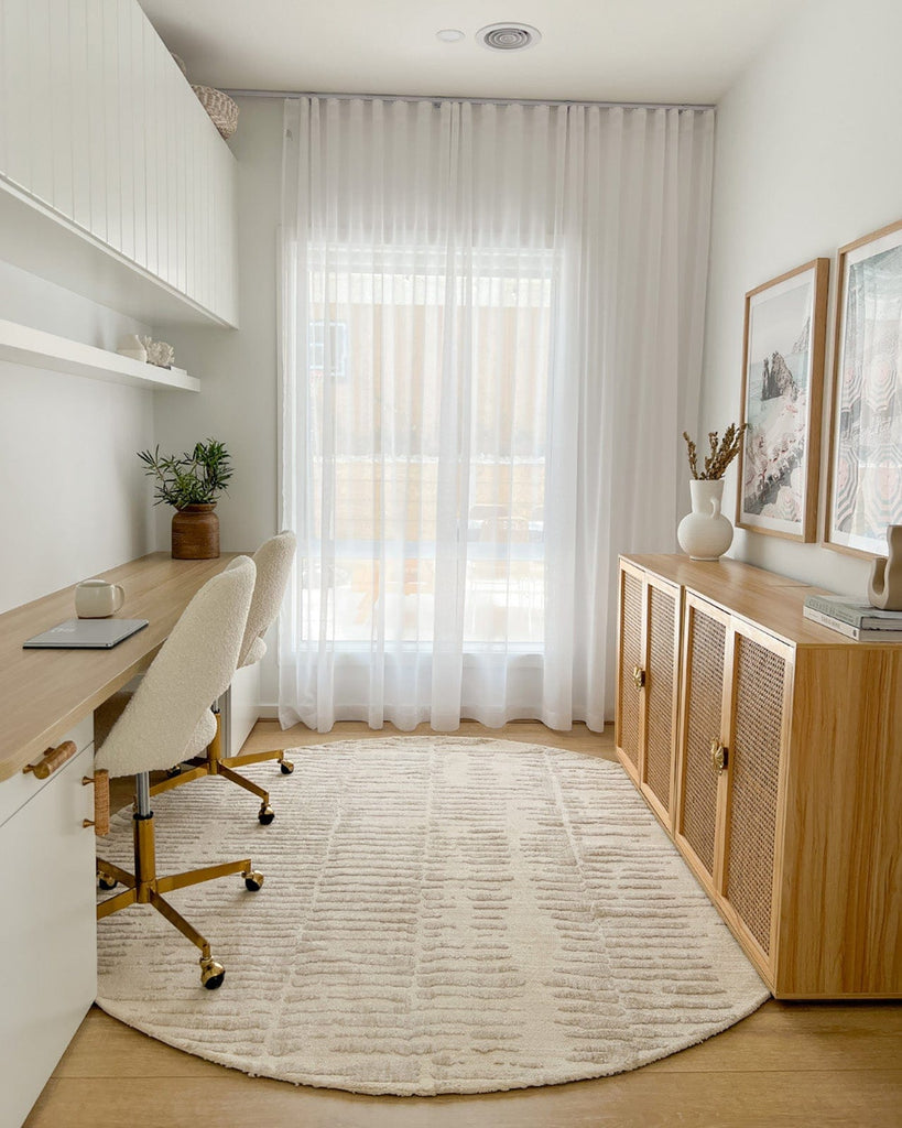 Nahba Ivory And Cream Textured Tribal Round Rug