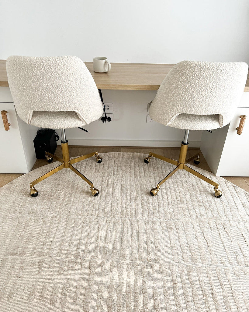 Nahba Ivory And Cream Textured Tribal Round Rug