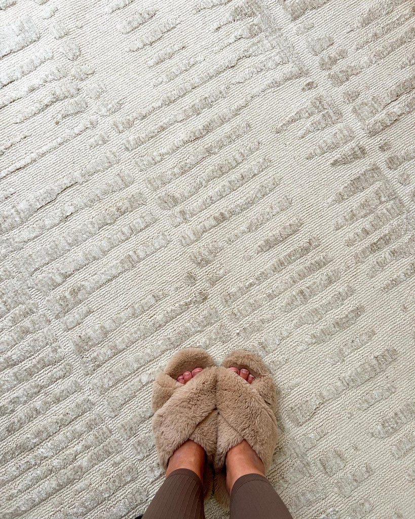 Nahba Ivory And Cream Textured Tribal Round Rug