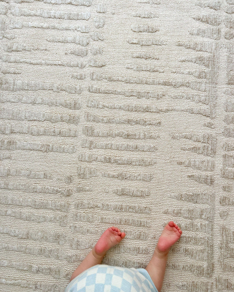 Nahba Ivory And Cream Textured Tribal Round Rug