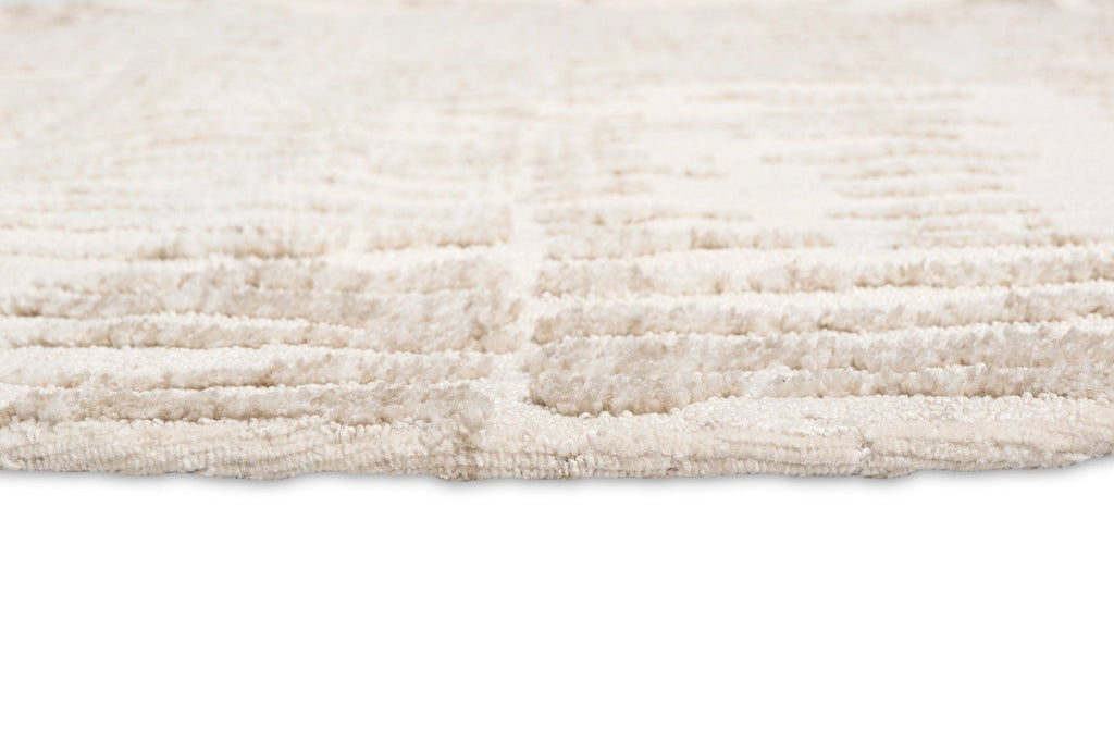 Nahba Ivory And Cream Textured Tribal Round Rug