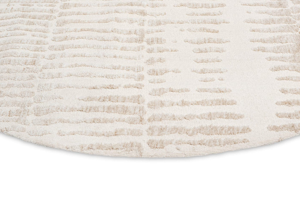 Nahba Ivory And Cream Textured Tribal Round Rug