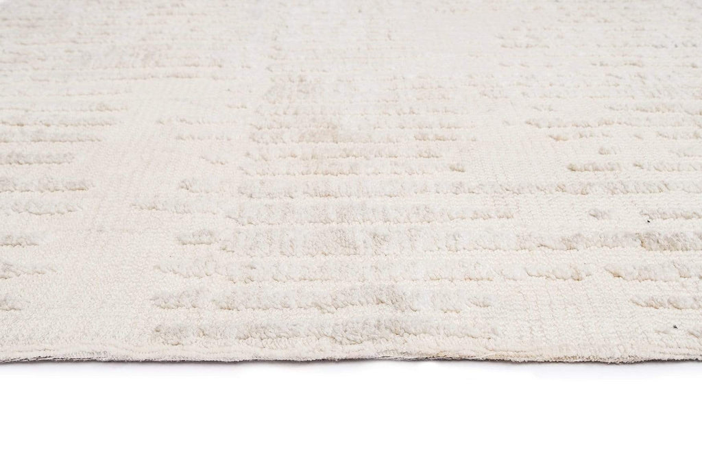 Nahba Ivory And Cream Textured Tribal Rug
