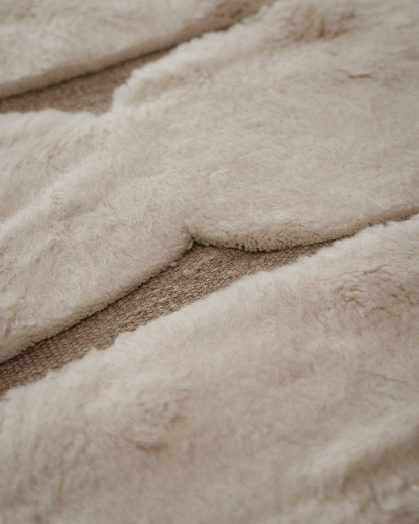 Olympia Ivory Textured Wool Round Rug