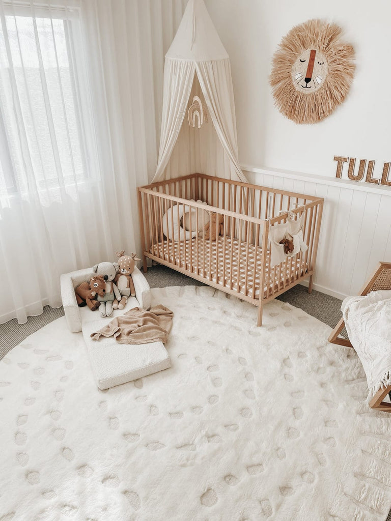 Omega Ivory Abstract Tribal Round Rug