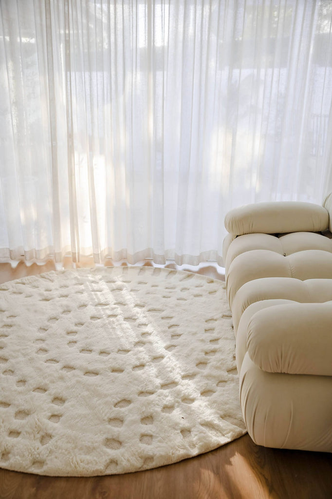 Omega Ivory Abstract Tribal Round Rug