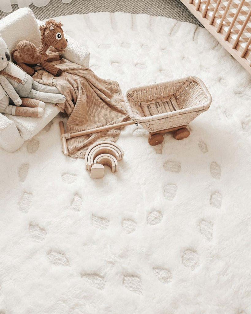 Omega Ivory Abstract Tribal Round Rug