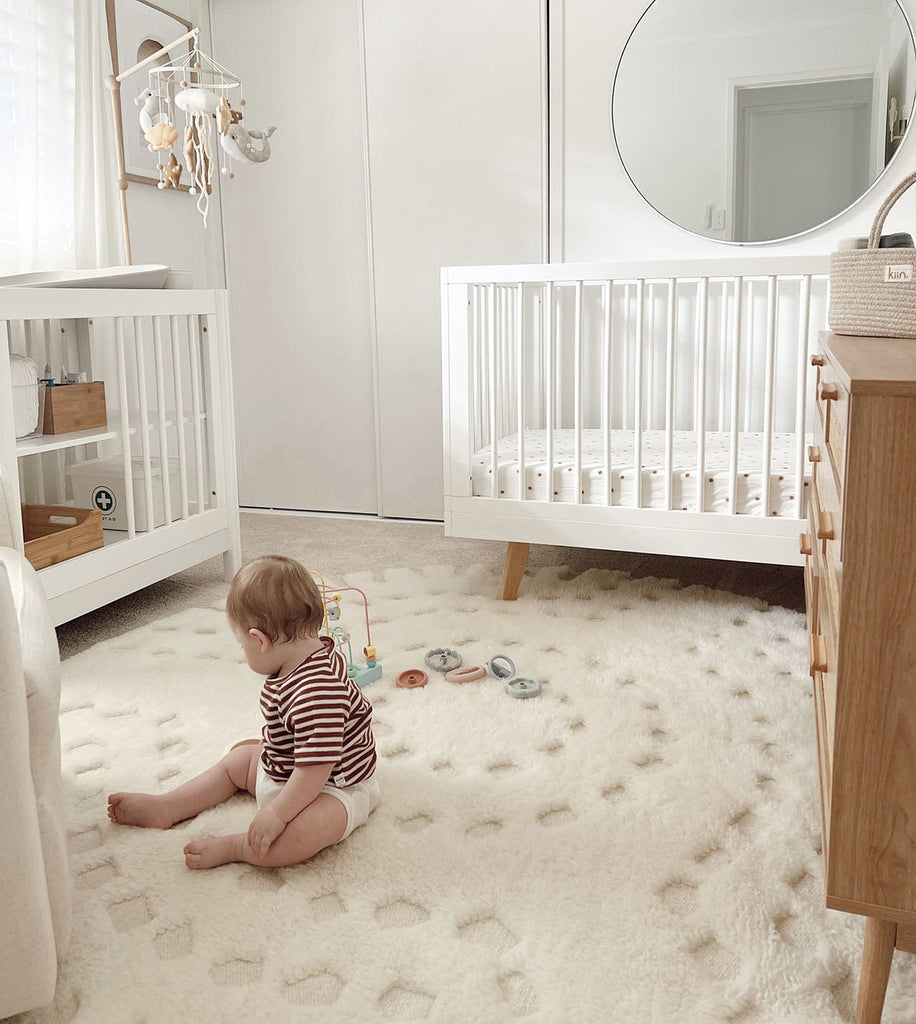 Omega Ivory Abstract Tribal Round Rug