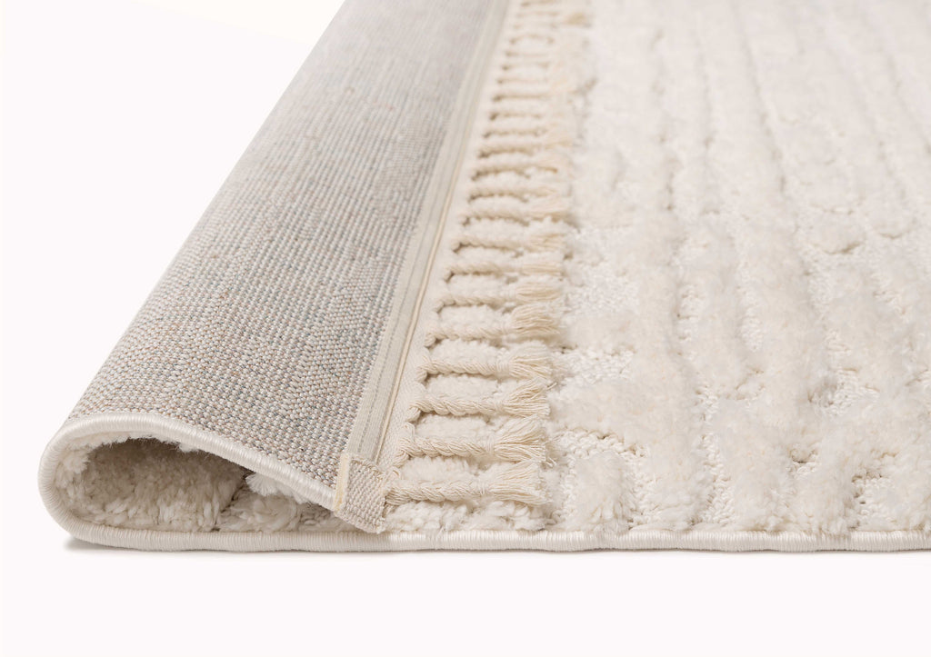 Serena Ivory Cream Textured Tassel Rug