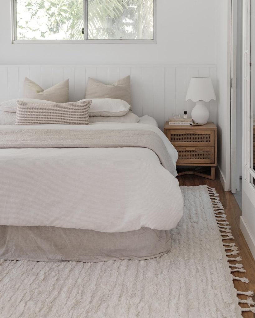 Serena Ivory Cream Textured Tassel Rug