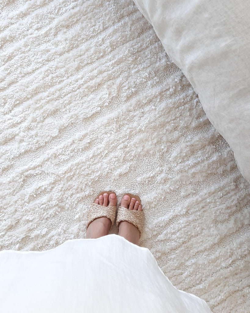 Serena Ivory Cream Textured Tassel Rug