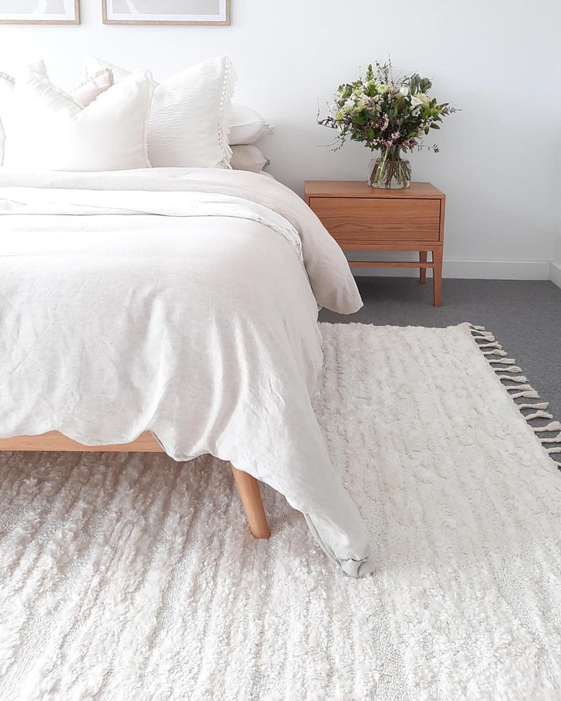 Serena Ivory Cream Textured Tassel Rug