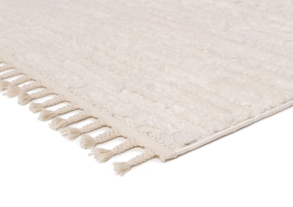 Serena Ivory Cream Textured Tassel Rug