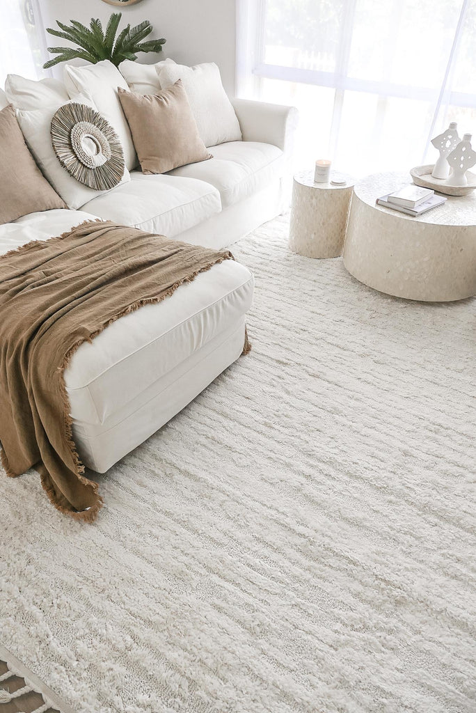 Serena Ivory Cream Textured Tassel Rug