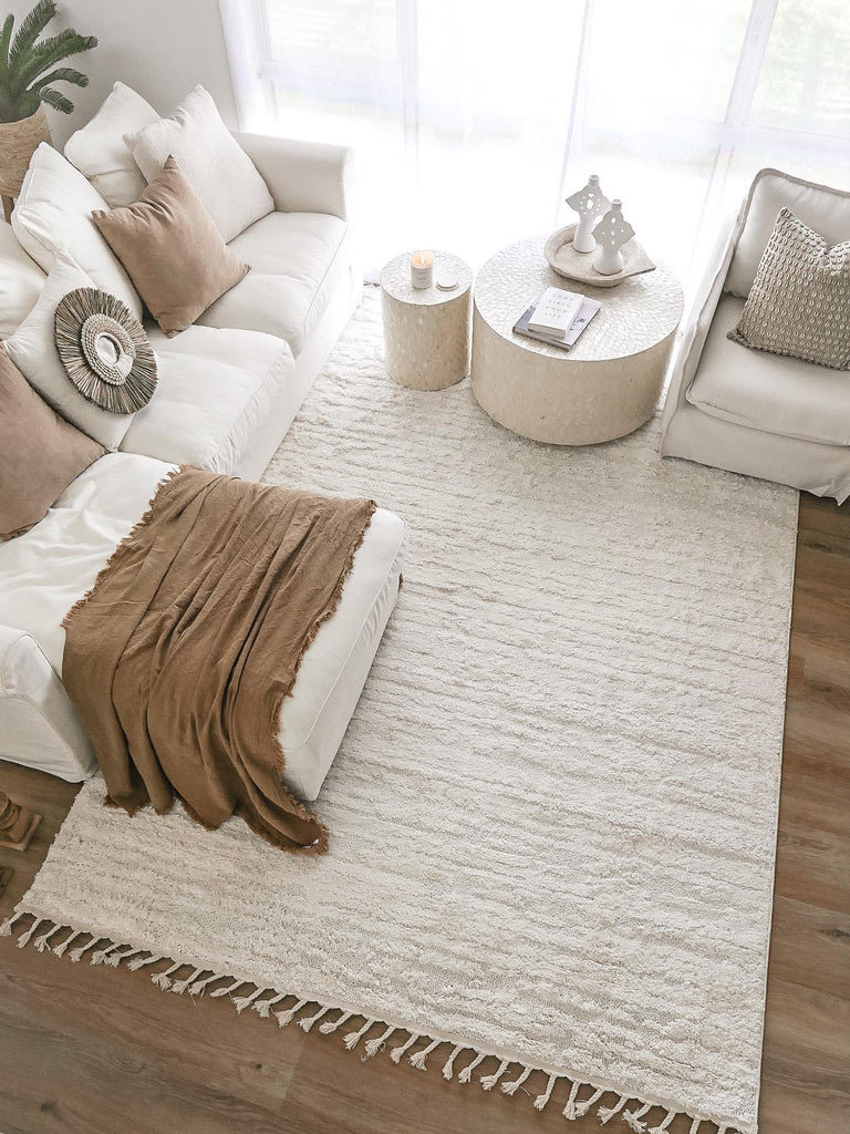Serena Ivory Cream Textured Tassel Rug