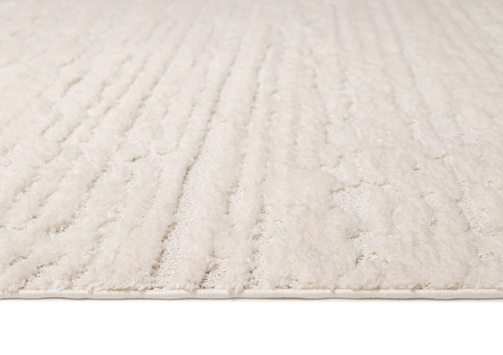 Serena Ivory Cream Textured Tassel Rug