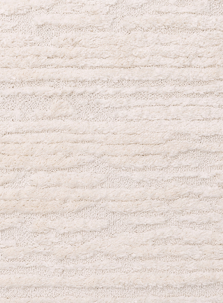 Serena Ivory Cream Textured Tassel Rug