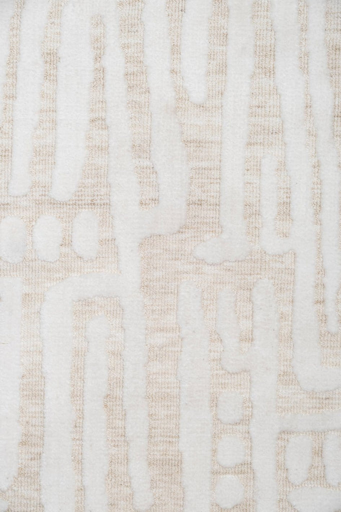 Trissa Beige and Ivory Abstract Tribal Rug
