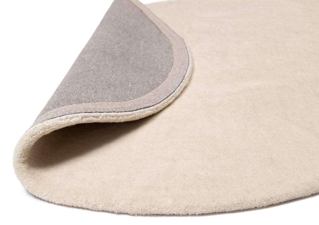 Vanni Solid Cream Curved Wool Rug