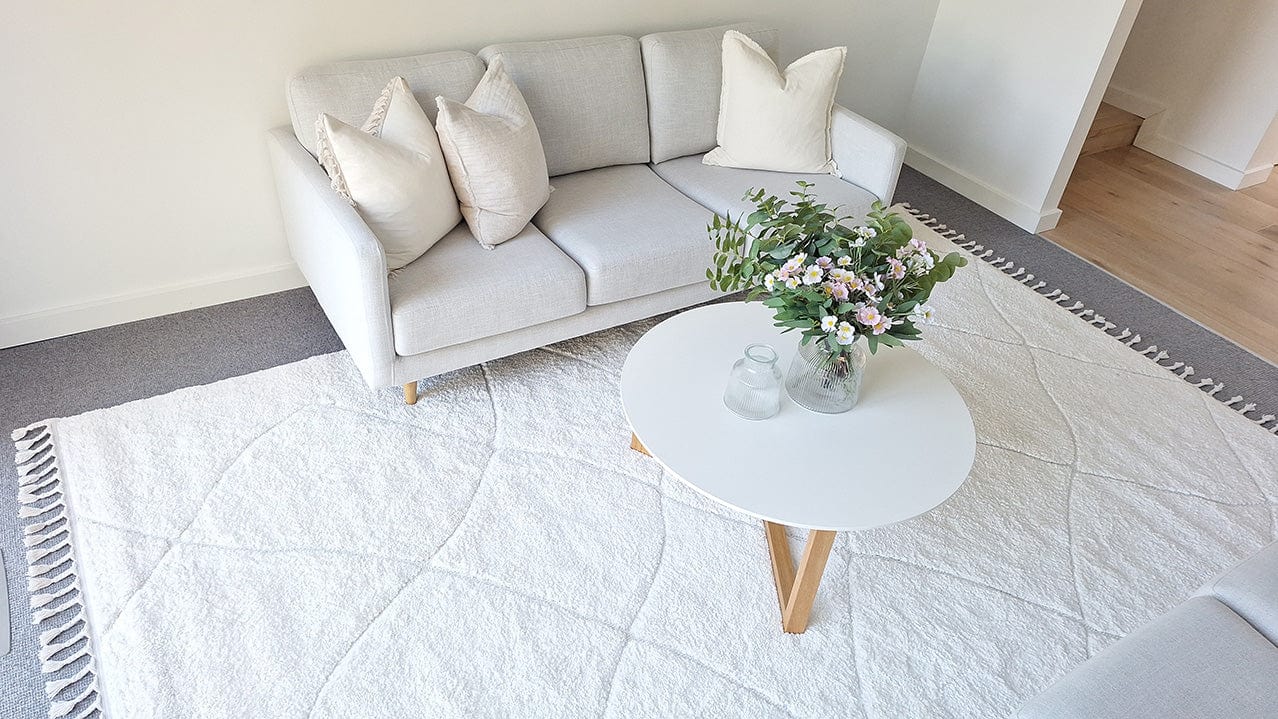 Calypso Ivory Cream Textured Tribal Tassel Rug