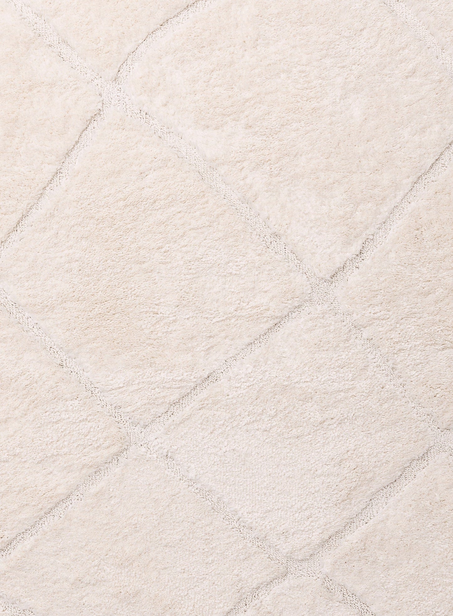 Calypso Ivory Cream Textured Tribal Tassel Rug