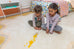 Esti Cream and Yellow Wiggle Bordered Washable Rug