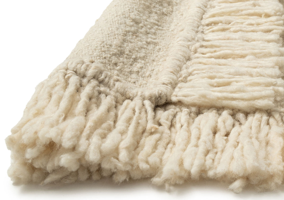 Sancha Cream Handmade Wool Fringe Rug