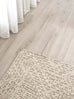 Takalo Beige and Ivory Textured Tribal Rug