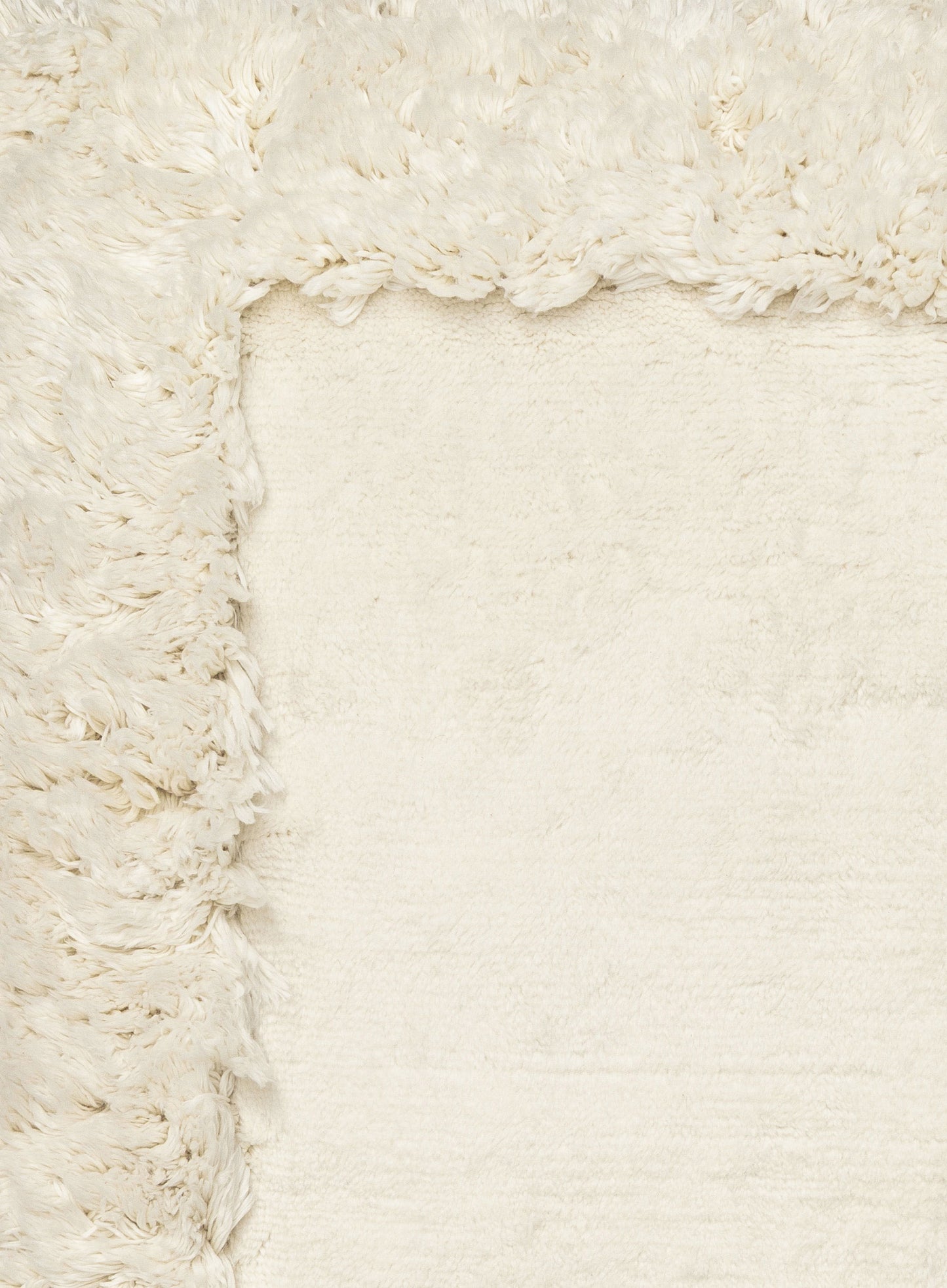 Yosefa Natural Cream Rectangular Shag Rug